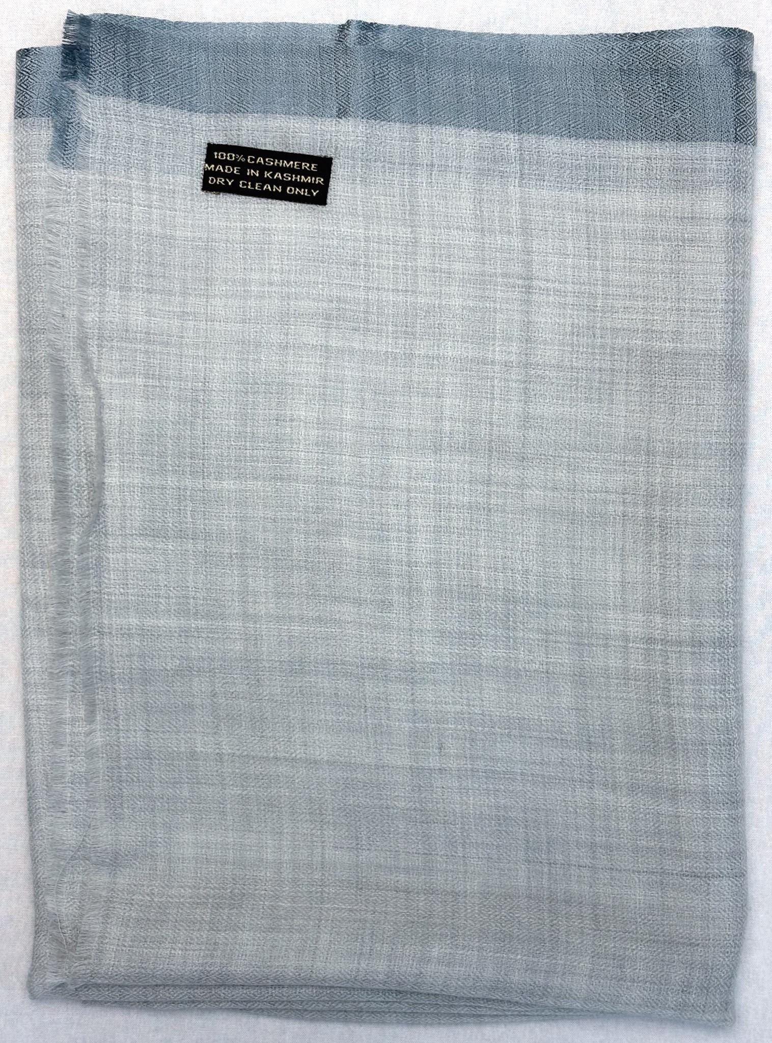 Gray checkered fabric with a label on a white background