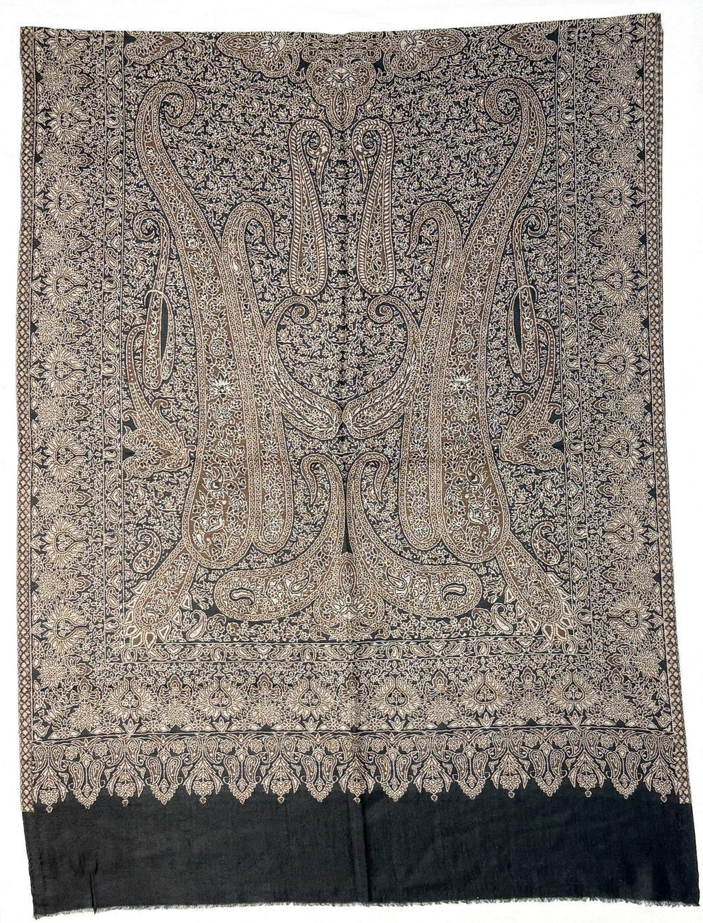 Decorative scarf with intricate paisley pattern on a plain background