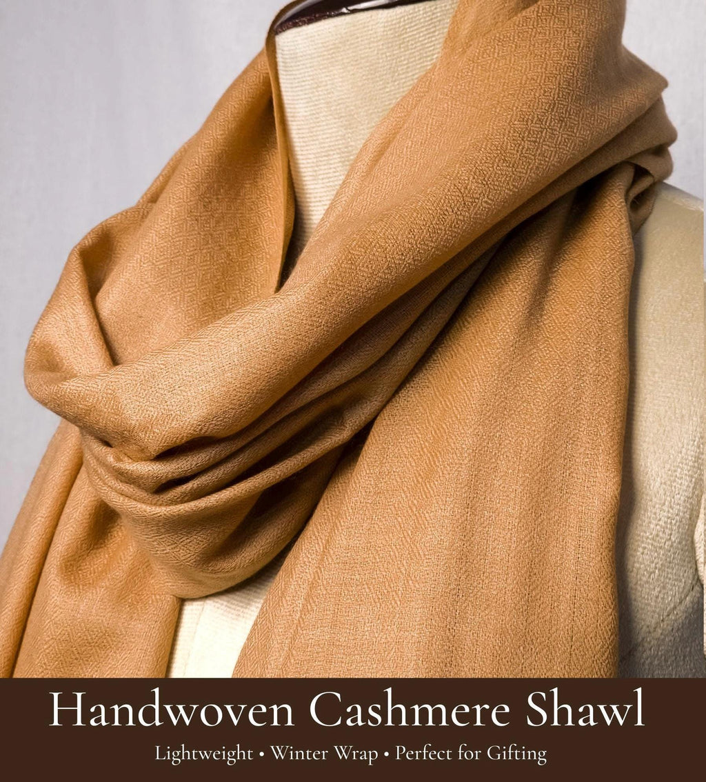 Brown handwoven cashmere shawl on a mannequin with text describing its features.