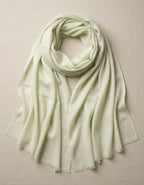 Light green scarf on a beige background