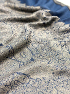 Close-up of patterned fabric with blue and white design