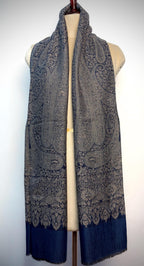 Paisley patterned scarf on a mannequin against a white background